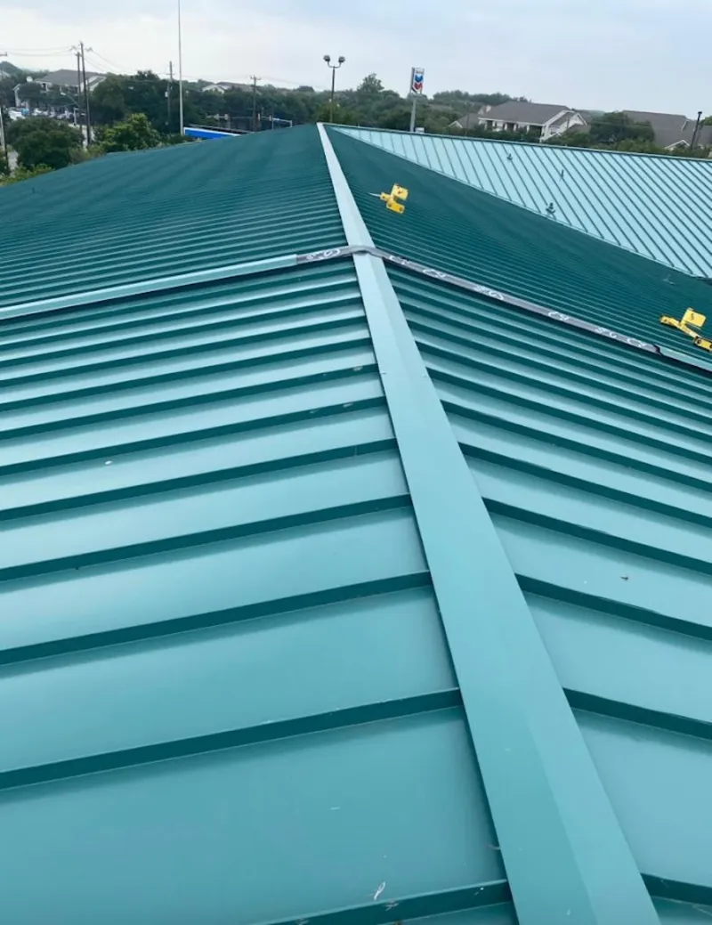 Green commercial metal roof ridge and valley for Metal Roof Repair in Garden City